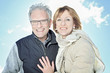 © Louis-Paul Photo - Portrait of happy senior couple in winter season