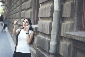 Wall Mural - woman talking on the phone