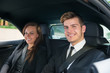 © Andrey Popov - Two Business People Sitting Inside The Car