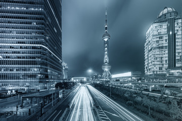 Wall Mural - Shanghai city skyscraper and China Oriental pearl tower at night