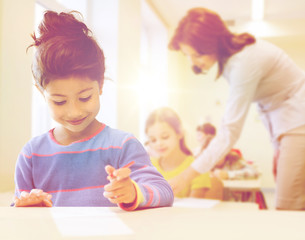 Sticker - happy little school girl over classroom background