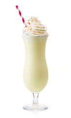 Poster - Glass of vanilla milkshake with whipped cream isolated on white