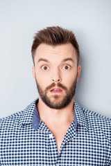 Wall Mural - It's unbelievable! Portrait of young handsome shocked man