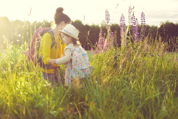 Wall Mural - Family backpackers in wood