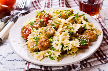 Wall Mural - Farfalle pasta with sausage