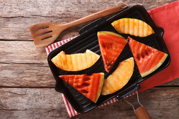 Wall Mural - Ripe Healthy organic Grilled watermelon and melon. Horizontal top view
