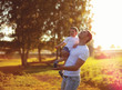 © guas - Happy father and son child having fun together, enjoying sunny s