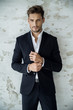 © kiuikson - Portrait of sexy man in black suit