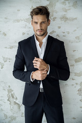 Portrait of sexy man in black suit