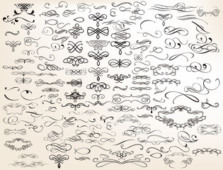 Wall Mural - Collection of vector hand drawn flourishes in engraved style. Me