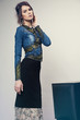 © EVGENY FREEONE - Woman in denim jacket and long dress