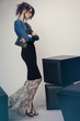 © EVGENY FREEONE - Woman in denim jacket and long dress