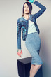 © EVGENY FREEONE - Young woman in denim clothes