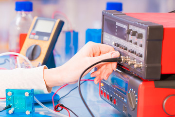 Poster - Woman scientist with hydrogen fuel cell in laboratory