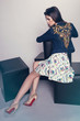 © EVGENY FREEONE - Woman in denim jacket and skirt