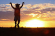 © Africa Studio - Cute girl silhouette on sunset background