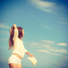 Happy woman on summer beach.