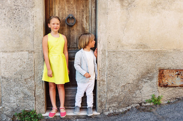 Wall Mural - Outdoor portrait of adorable fashion kids