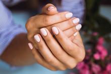 Beautiful Woman's Nails With Beautiful Pink Manicure