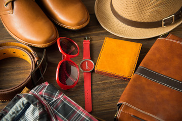 Wall Mural - Flat lay of men casual fashion on wooden floor