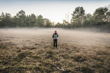 Person On Misty Open Field, Augsburg, Bavaria, Germany