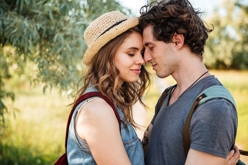 Poster - Close up portrait of an attractive couple in love embracing