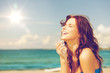 © Syda Productions - laughing woman on the beach
