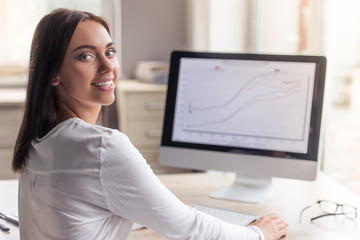 Attractive business lady in office