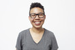 © Granger Wootz/Blend Images - Smiling mixed race woman wearing eyeglasses