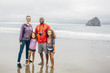 © Inti St Clair/Blend Images - Family smiling on beach