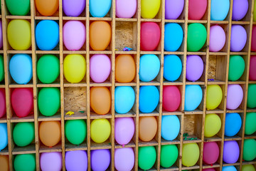 darts shooting gallery with colorful balloons