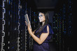 © Erik Isakson/Blend Images - Indian businesswoman working in server room