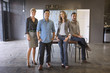 © Sam Diephuis/Blend Images - Business people smiling in office