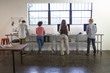 © Sam Diephuis/Blend Images - Business people working in office