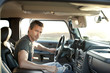 © Eric Raptosh Photography/Blend Images - Caucasian man getting into truck