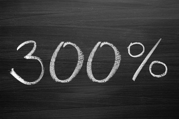 Wall Mural - 200-percent title written with a chalk on the blackboard