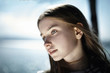 © Vladimir Serov/Blend Images - Pensive Caucasian girl at lake