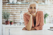 © Lumina Images/Blend Images - Older Caucasian woman smiling in kitchen