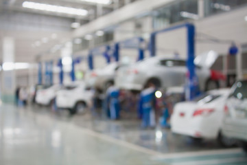 car repair service center blurred background