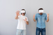 © zinkevych - Emotional men using virtual reality device