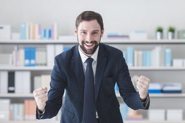 Wall Mural - Cheerful successful businessman