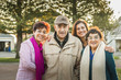 © Sollina Images/Blend Images - Hispanic Multi-generation family smiling outdoors
