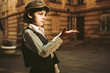 © Sophie Filippova/Blend Images - Caucasian boy wearing old-fashioned clothing tossing marble