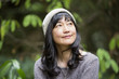 © Jed Share/Kaoru Share/Blend Images - Japanese woman in garden