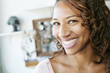 © Peathegee Inc/Blend Images - African American woman smiling in store
