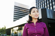 © Peathegee Inc/Blend Images - Asian businesswoman walking outdoors