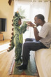 © Hello Lovely/Blend Images - African American father playing with daughter in costume