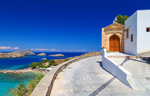 Beautiful House In Lindos On The Background Of The Bay, Yachts And Ships  Rhodes Greece