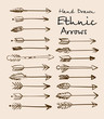 © adamchuk_leo - Set of ethnic arrows hand-drawn on a beige background for your design. Vector