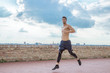 © HD92 - Young man running jogging jump